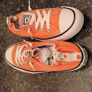 Womens converse size 8.5 coral in color